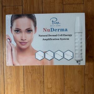 Pure Daily Care NuDerma Skin Therapy Device - White. Never been opened